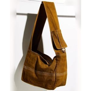 We the free waxed canvas sling